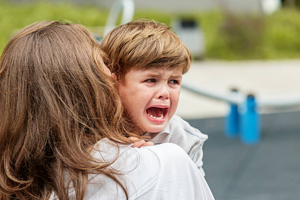 Parent calmly supporting a child during emotional meltdown, focusing on emotional regulation, connection, and communication skills.